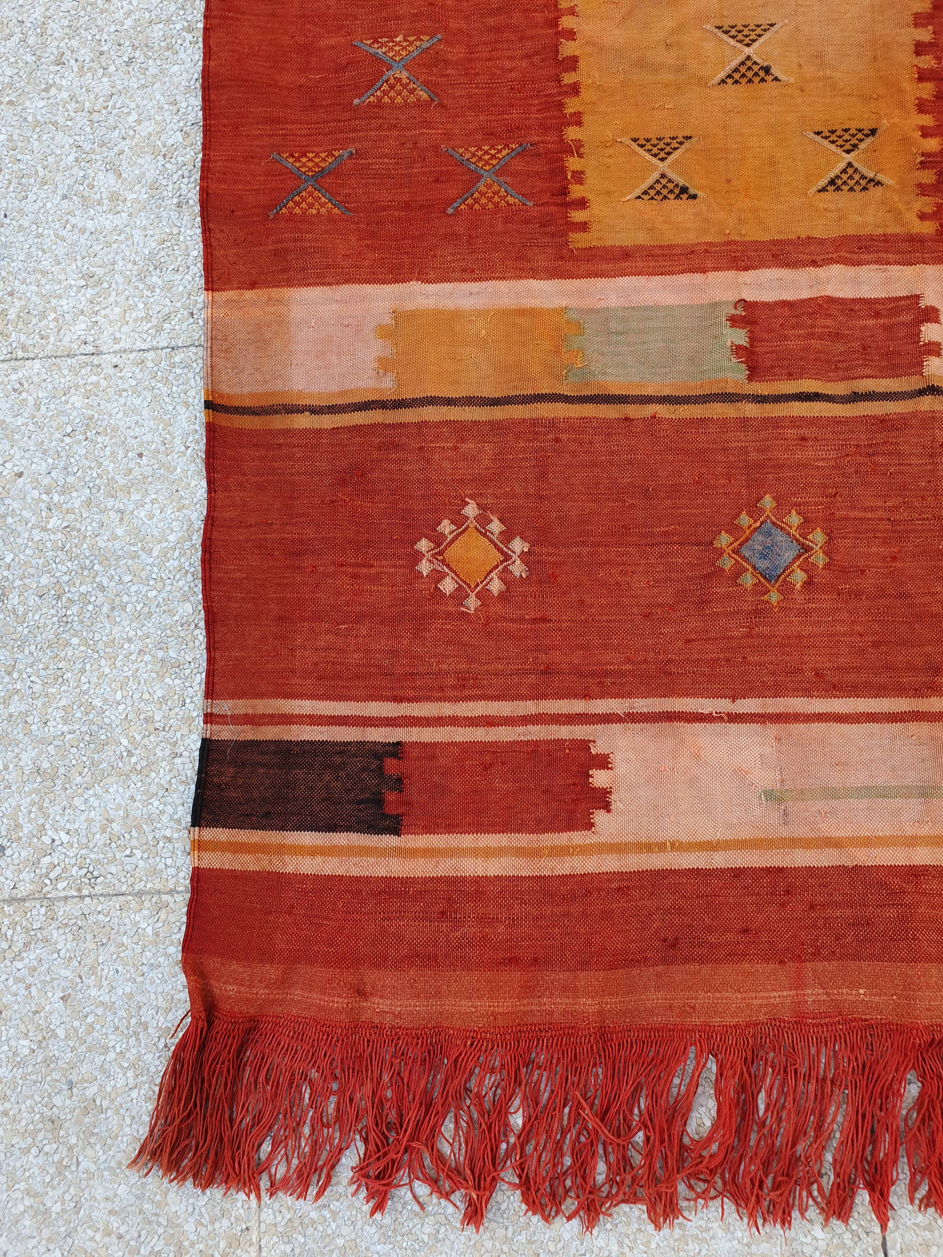 Orange red ethnic carpet 140x82 cm
