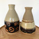 Artisanal sandstone form bottles