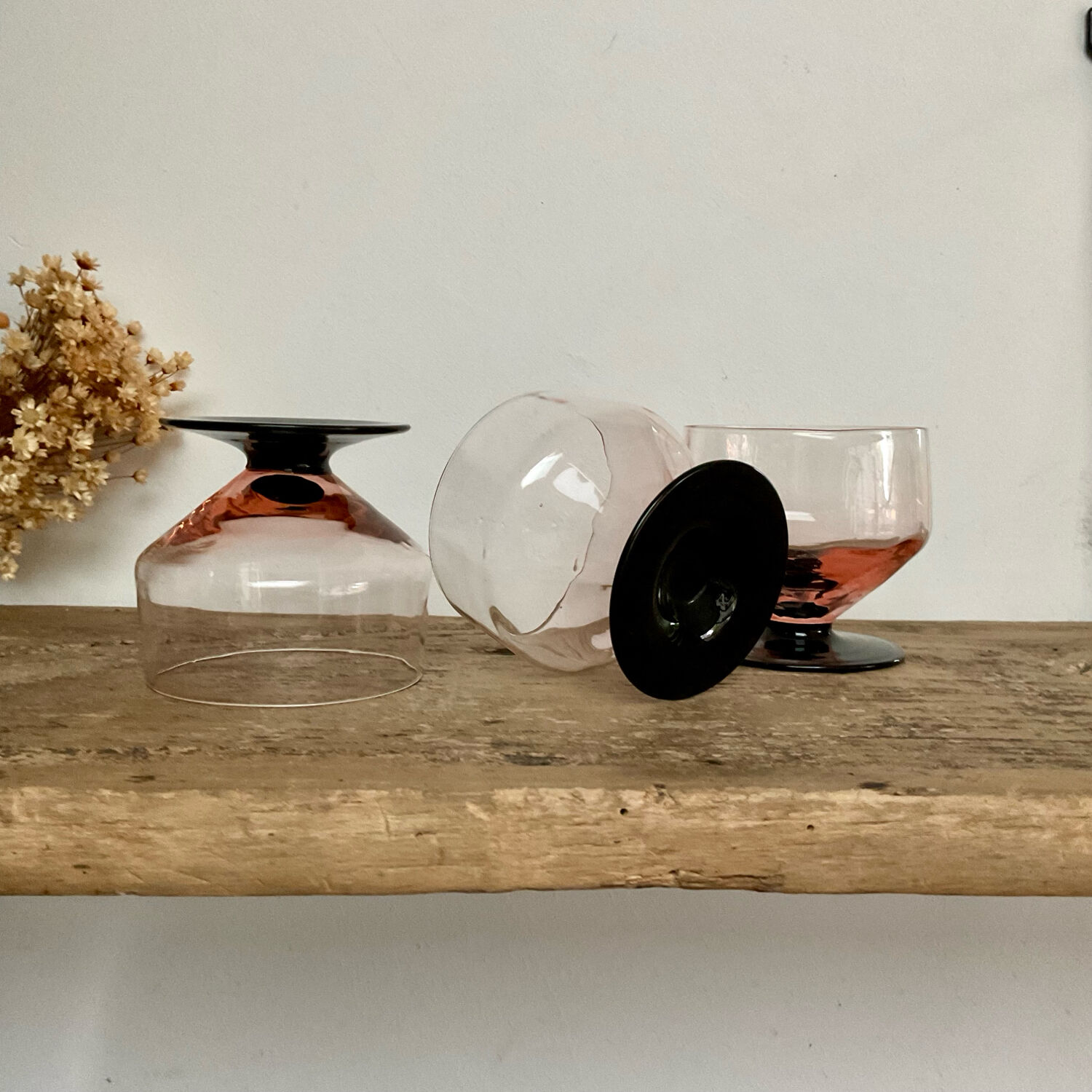 6 pink bowls with black stems