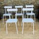 Ensemble de 5 chaises blanches en bois