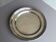 Plat rond en metal argente poinçonné