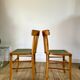 Pair of bistro chairs in light curved wood and green seat 1950s