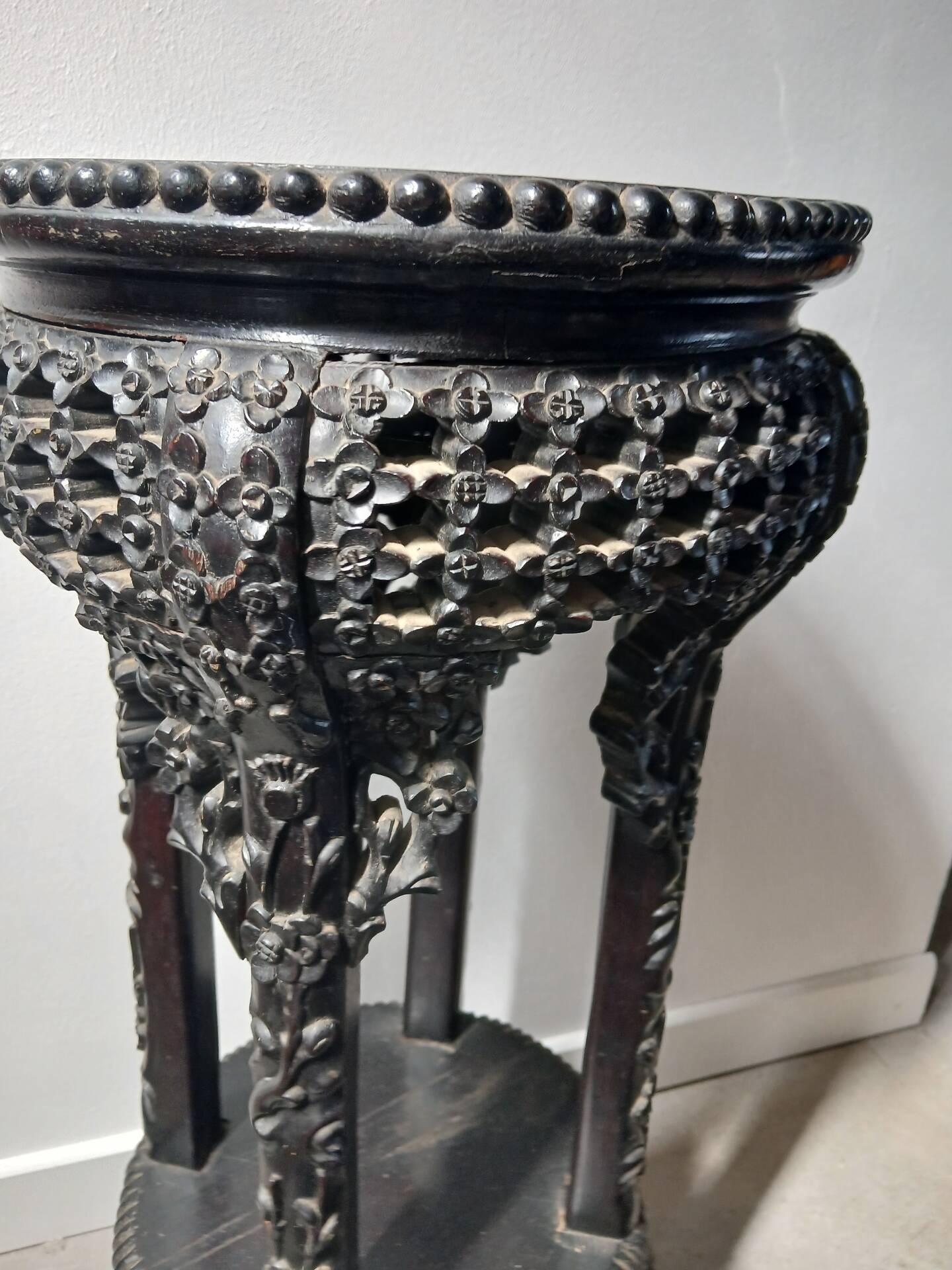 Antique Japanese stand or side table from the late 19th century.