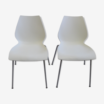 Pair of white chairs by Kartell model Maui