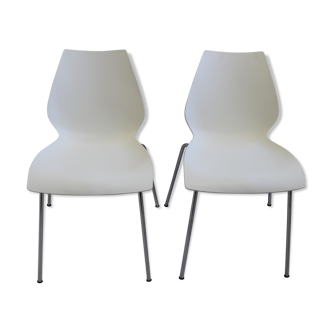 Pair of white chairs by Kartell model Maui