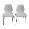 Pair of white chairs by Kartell model Maui