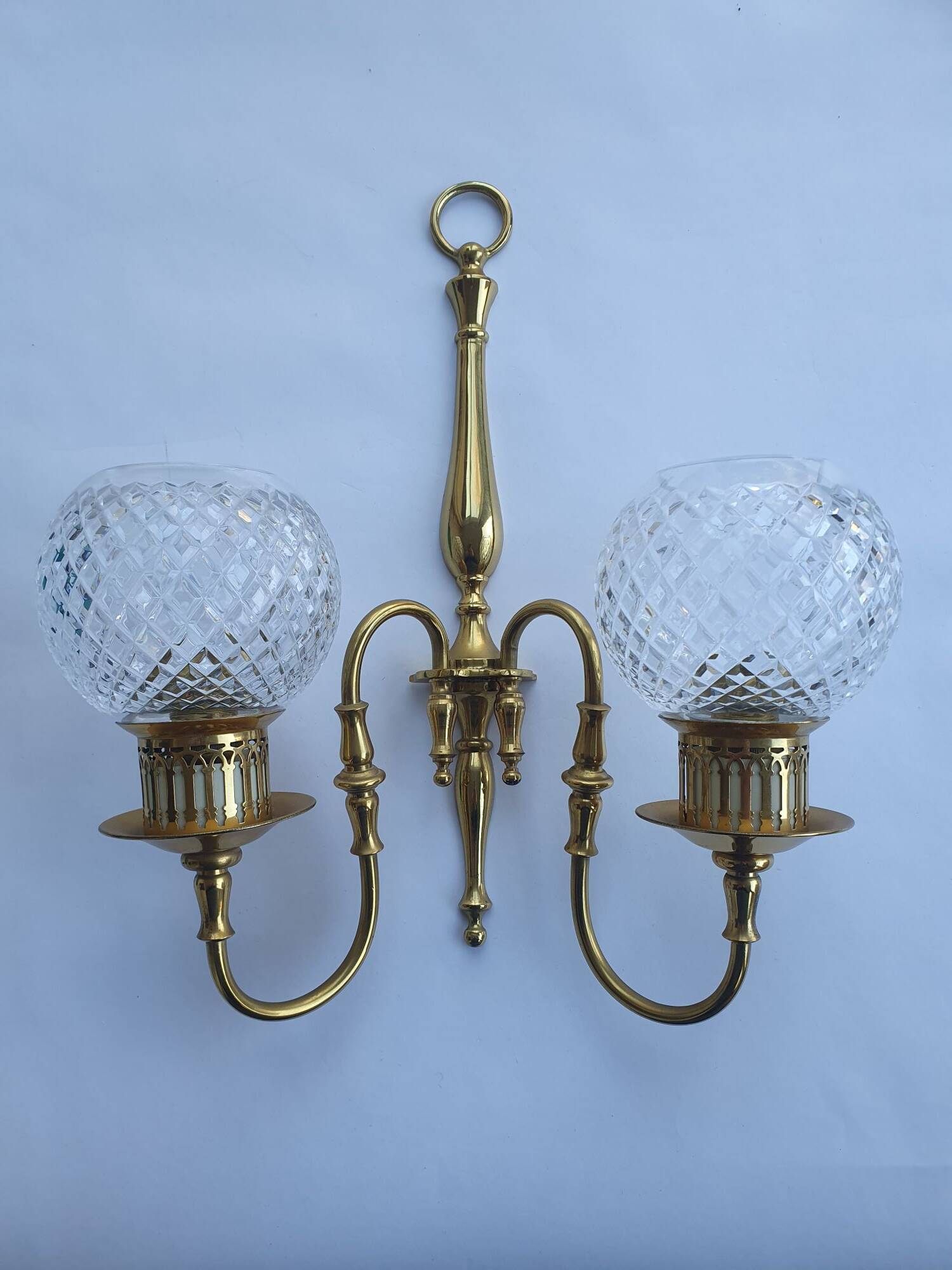 Two-light wall light gold with antique crystal globes
