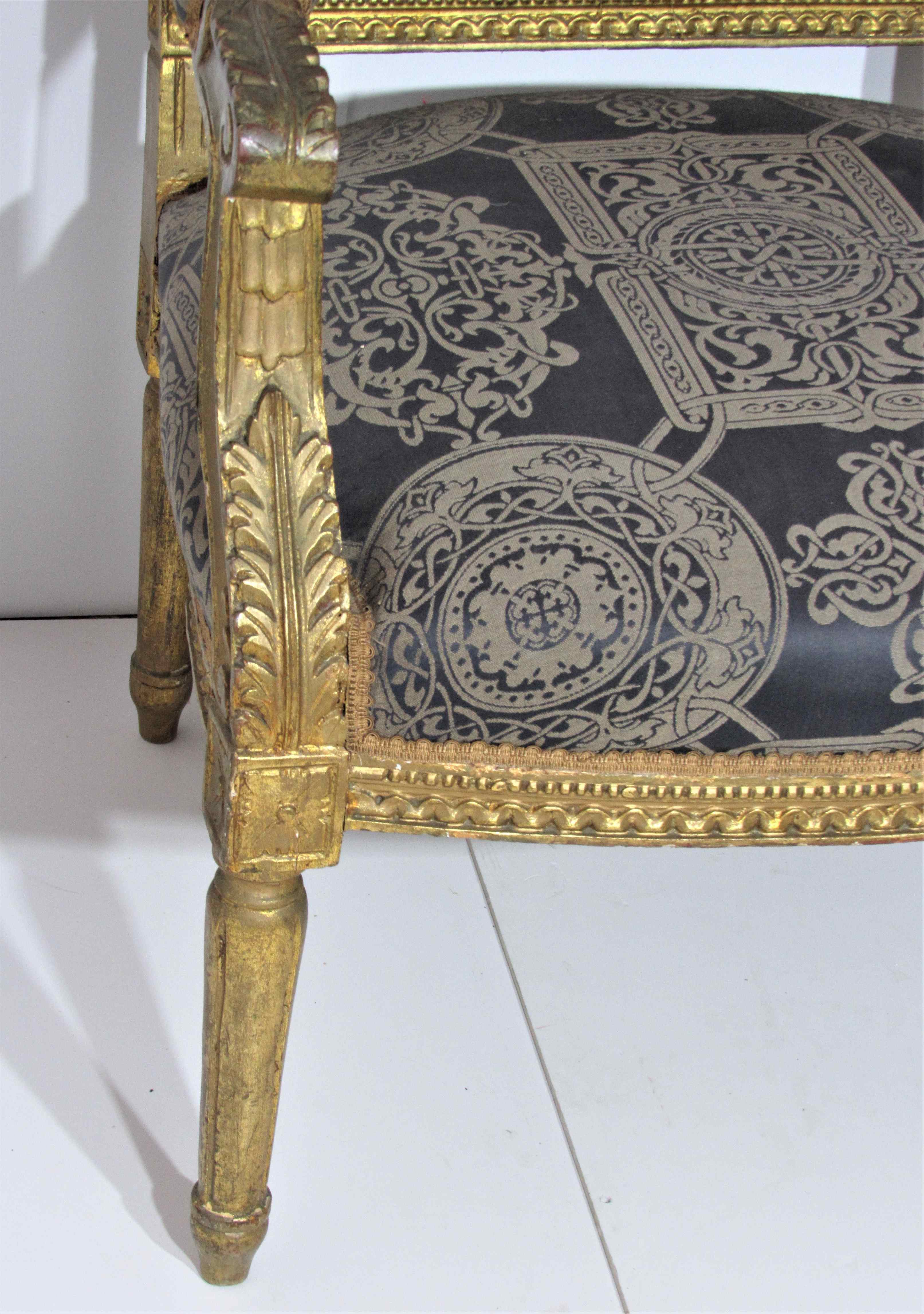4 armchairs and a gilded wooden sofa Louis XVI style