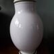 Vintage vase with herbalist pot decoration