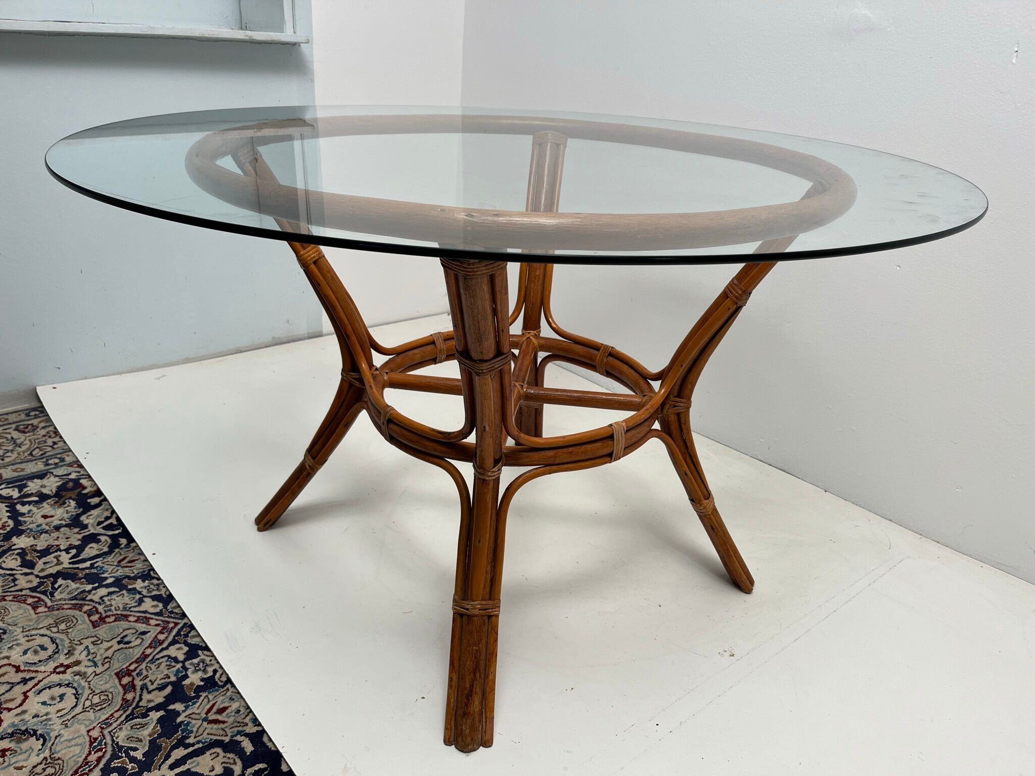 Vintage glass top rattan dining table
