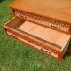 Rattan and wood splayed-leg chest of drawers
