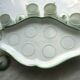 Porcelain cream service of Paris 1850, 6 pots on green and gold oval tray