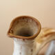 Pitcher in sandstone Roger Jacques