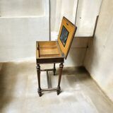 Antique wooden work table, inlaid top and interior mirror.