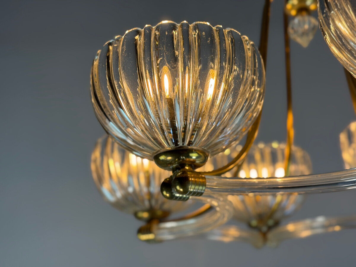 Venetian chandelier in colourless Murano glass and brass, circa 1940.