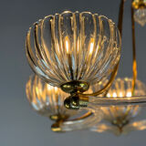 Venetian chandelier in colourless Murano glass and brass, circa 1940.