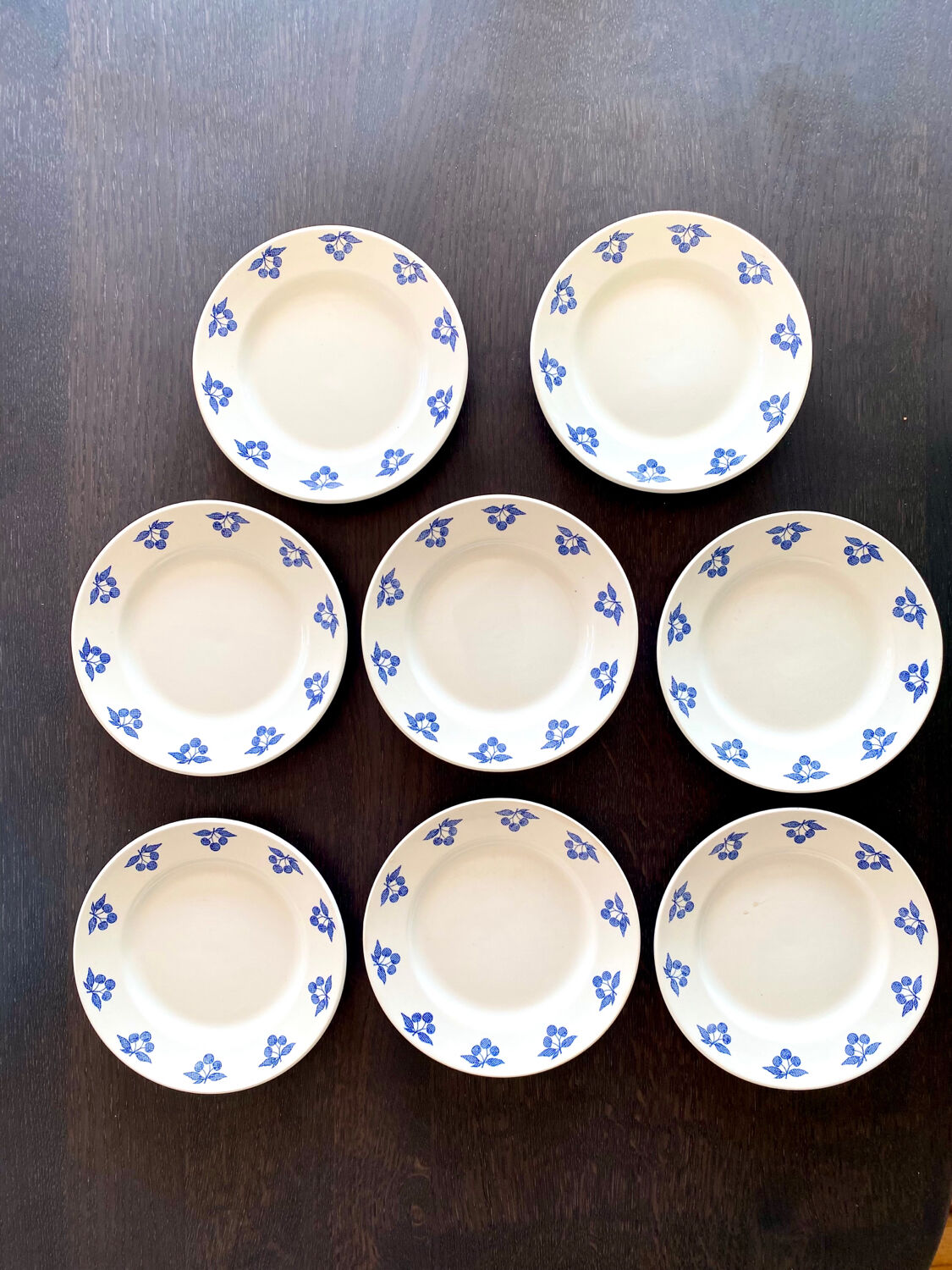 Set of eight dessert plates – blue cherry patterns – stamped