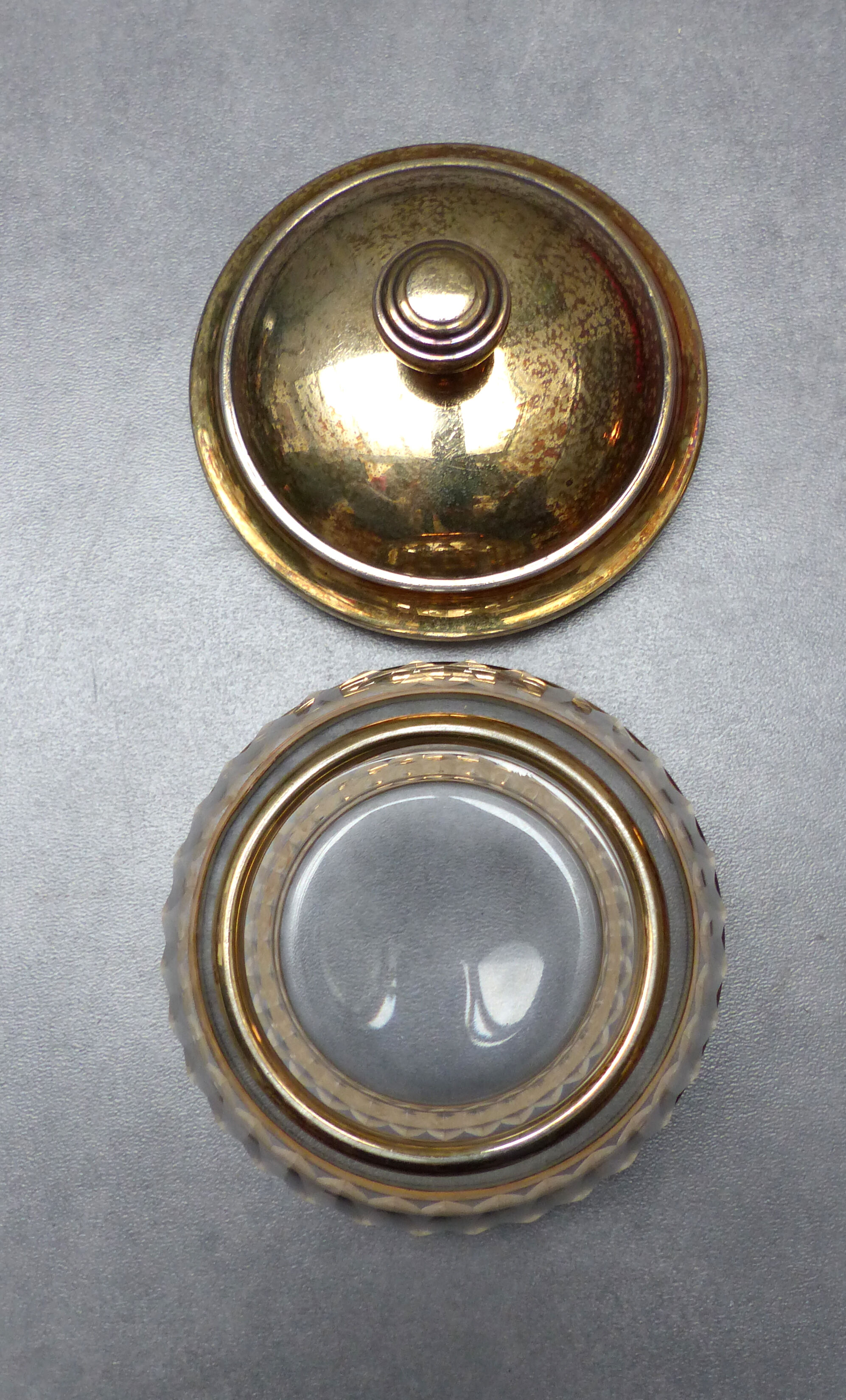 2 old-cut glass jars with gold-plated lid