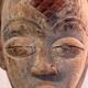 Punu mask on a base