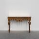 Console murale dorée et sculptée de style baroque italien du XXe siècle