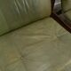 Fauteuil en cuir vert et bois de chêne