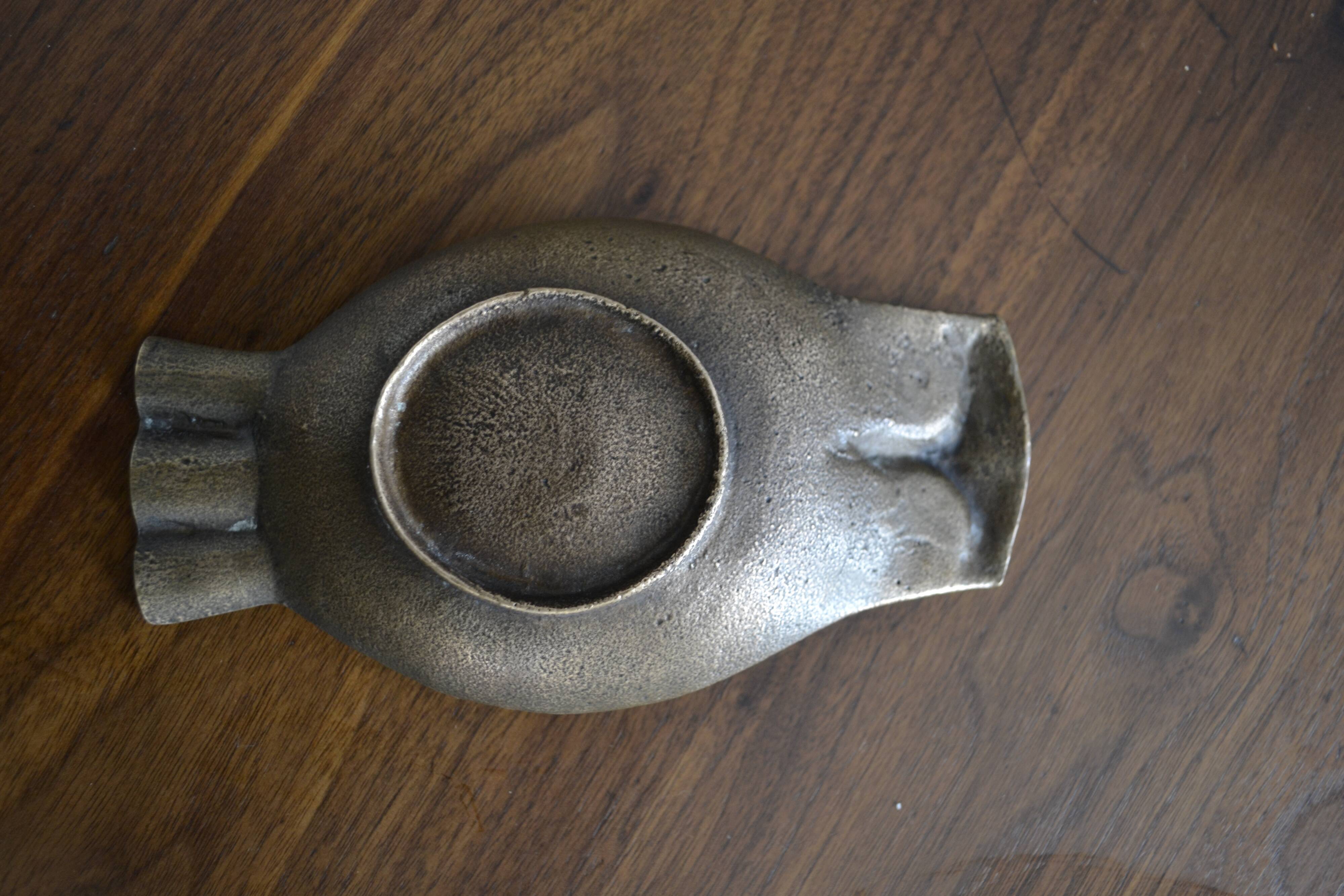 Empty owl brass pocket