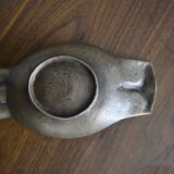 Empty owl brass pocket