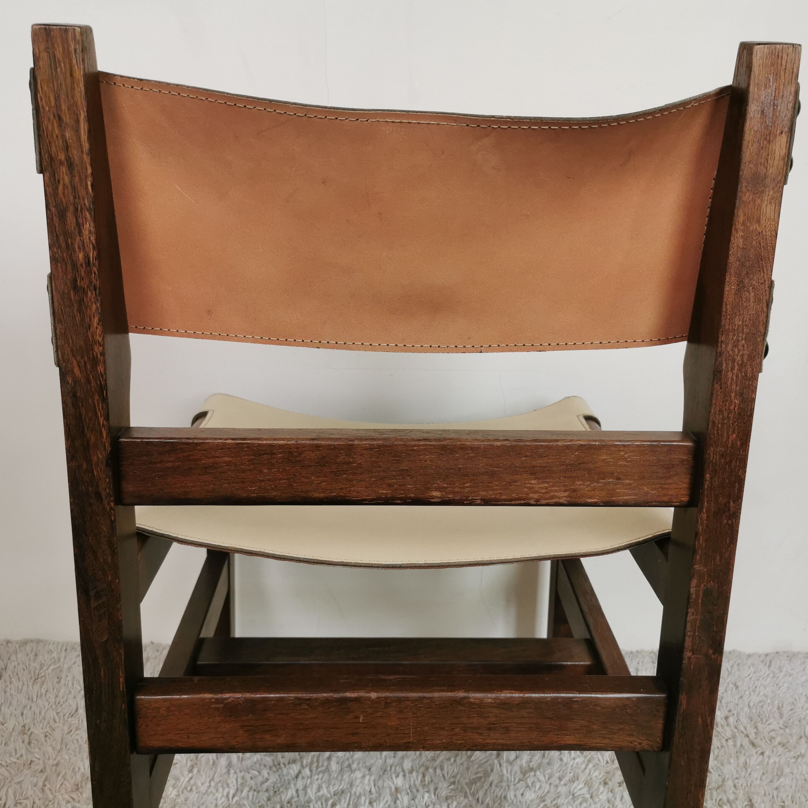 Series of 4 wooden and leather chairs