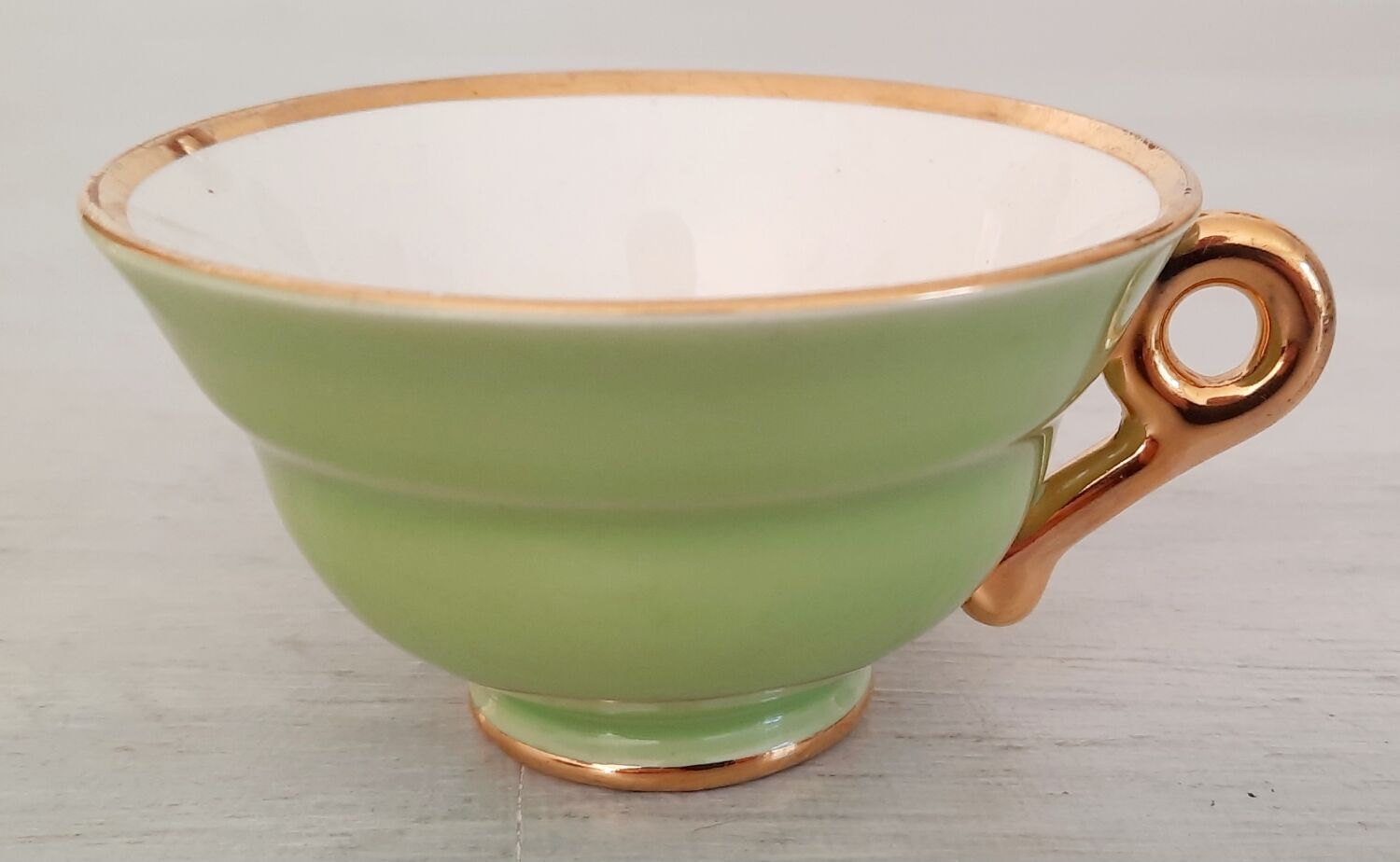 Coffee cup and under cup in green Salins earthenware and vintage gold net
