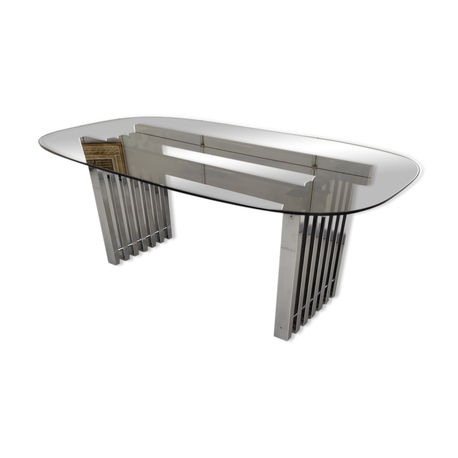 Chrome base diningroom table with smoked glass oval top