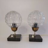 A pair of bedside lamps