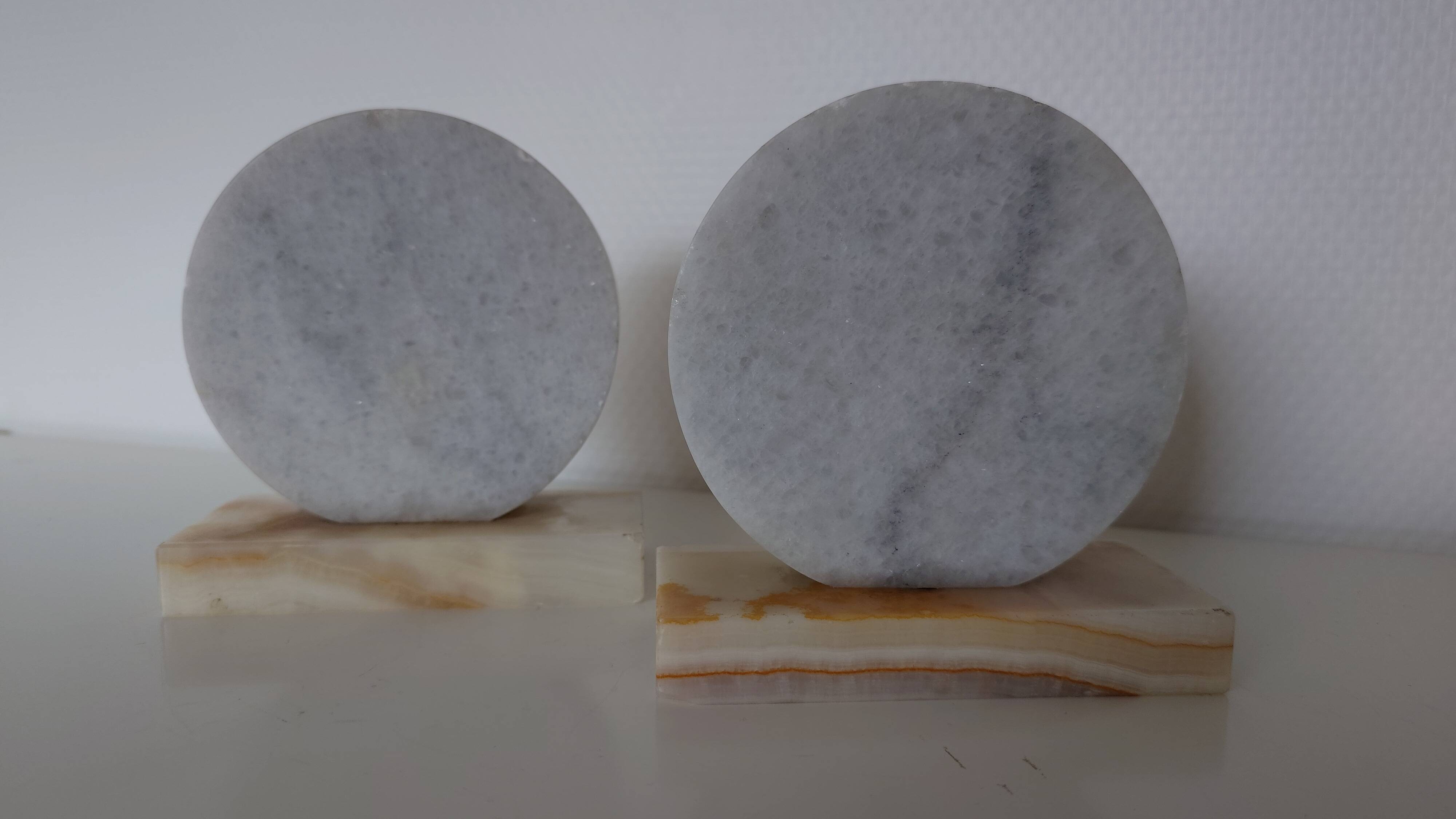 Pair of marble and onyx bookends, geometric design, Art Deco style.