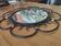 Wrought iron mirror with gilt metal rings, circa 1950 - 39cm