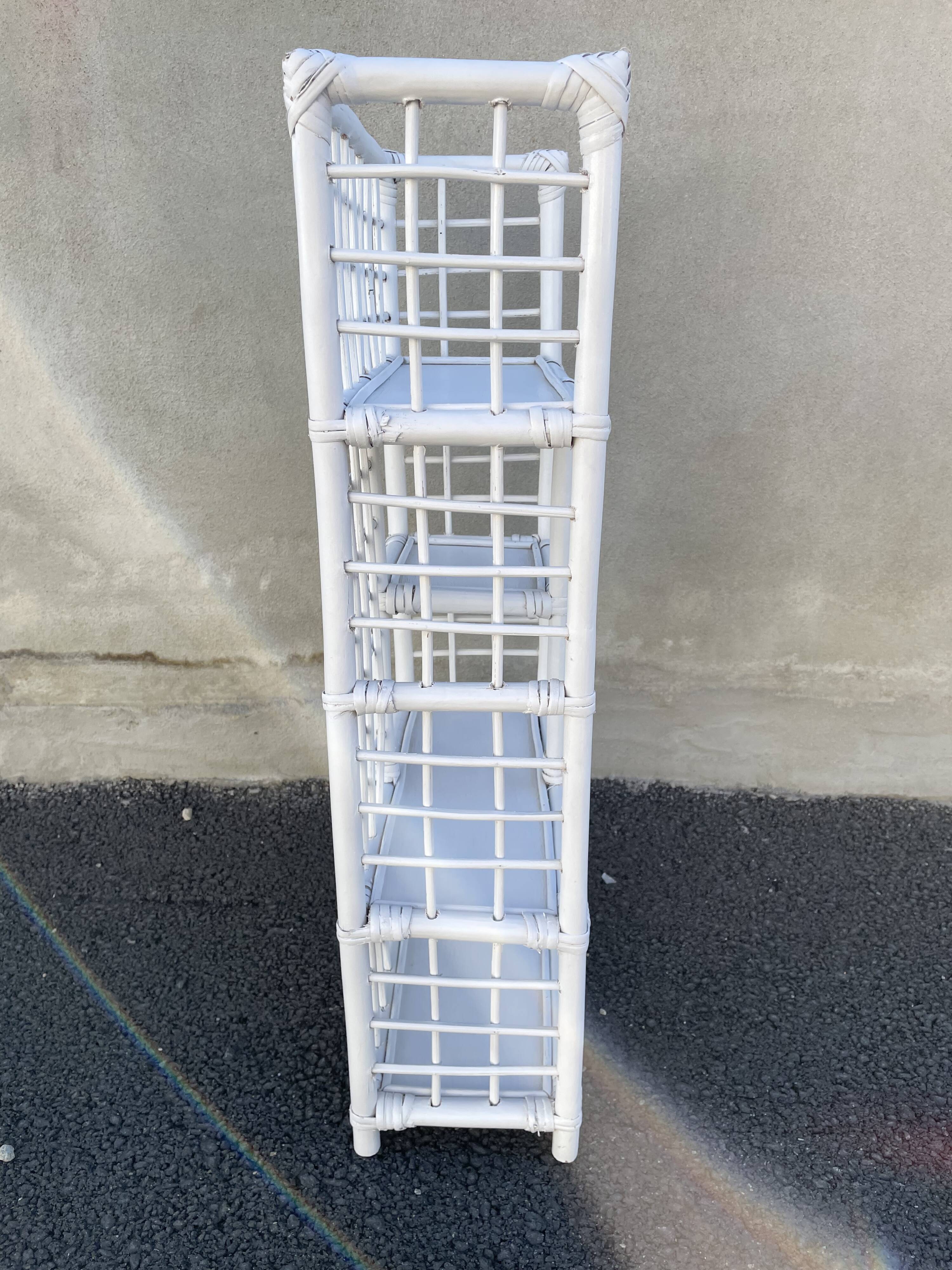 White rattan shelf with braces