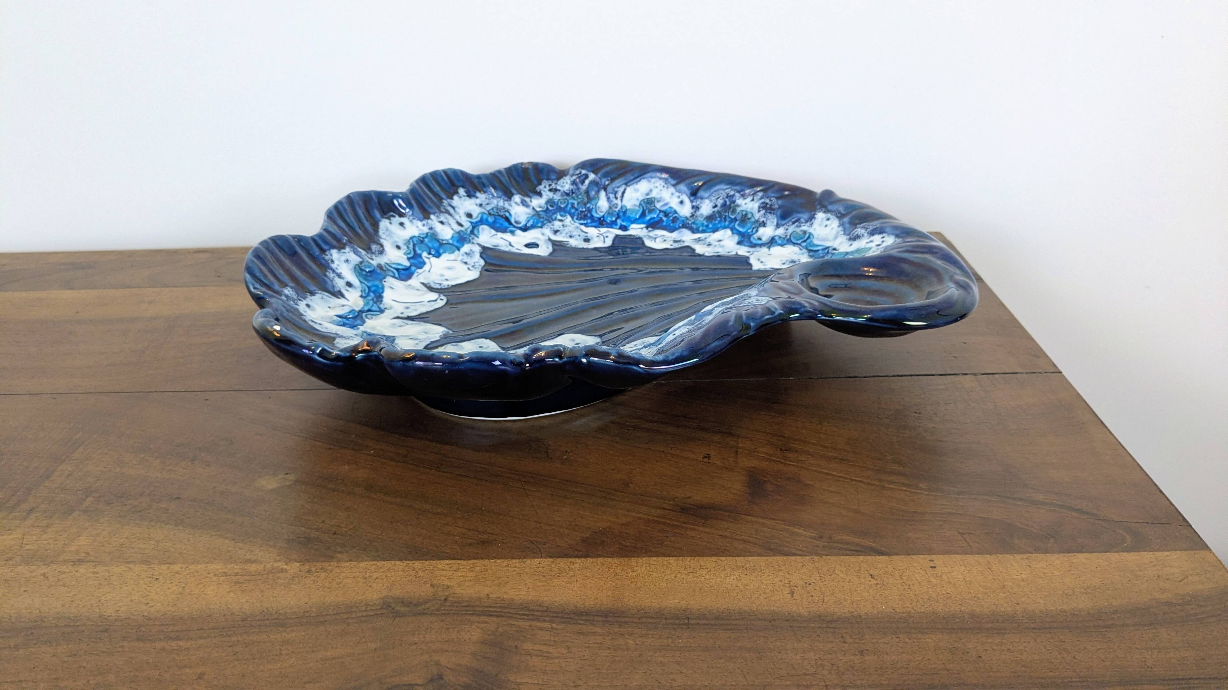 Large vintage shell-shaped blue glazed ceramic bowl