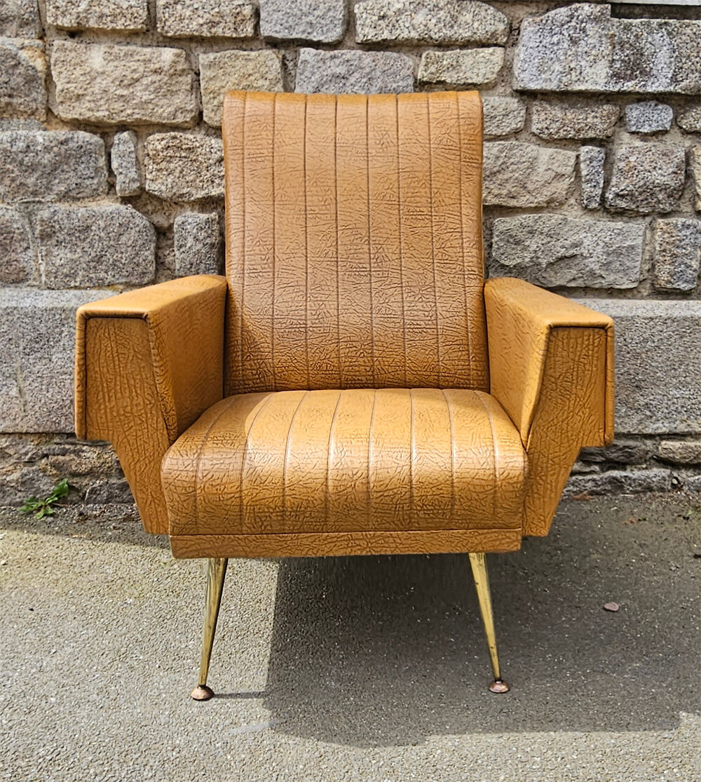 Pair of mustard skaï armchairs, brass feet