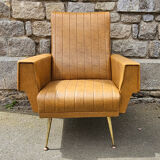 Pair of mustard skaï armchairs, brass feet