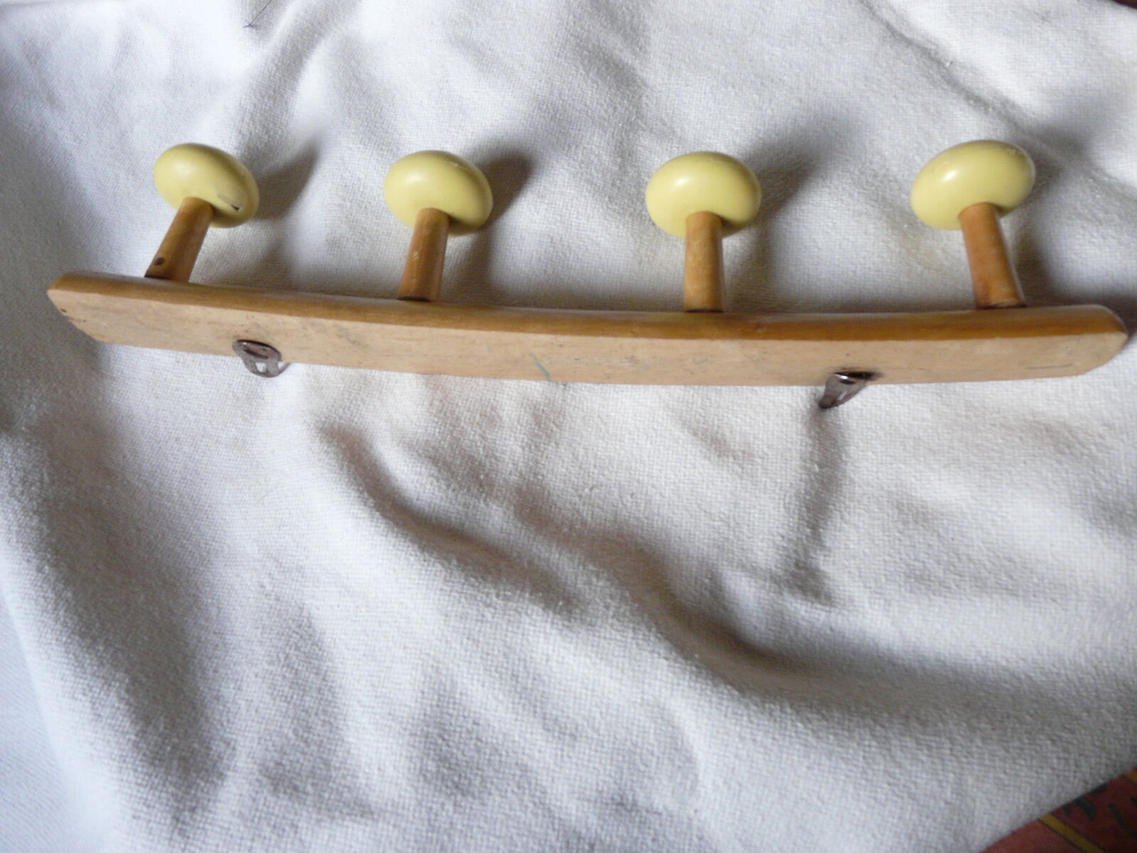 Wearing coat wooden with colored balls