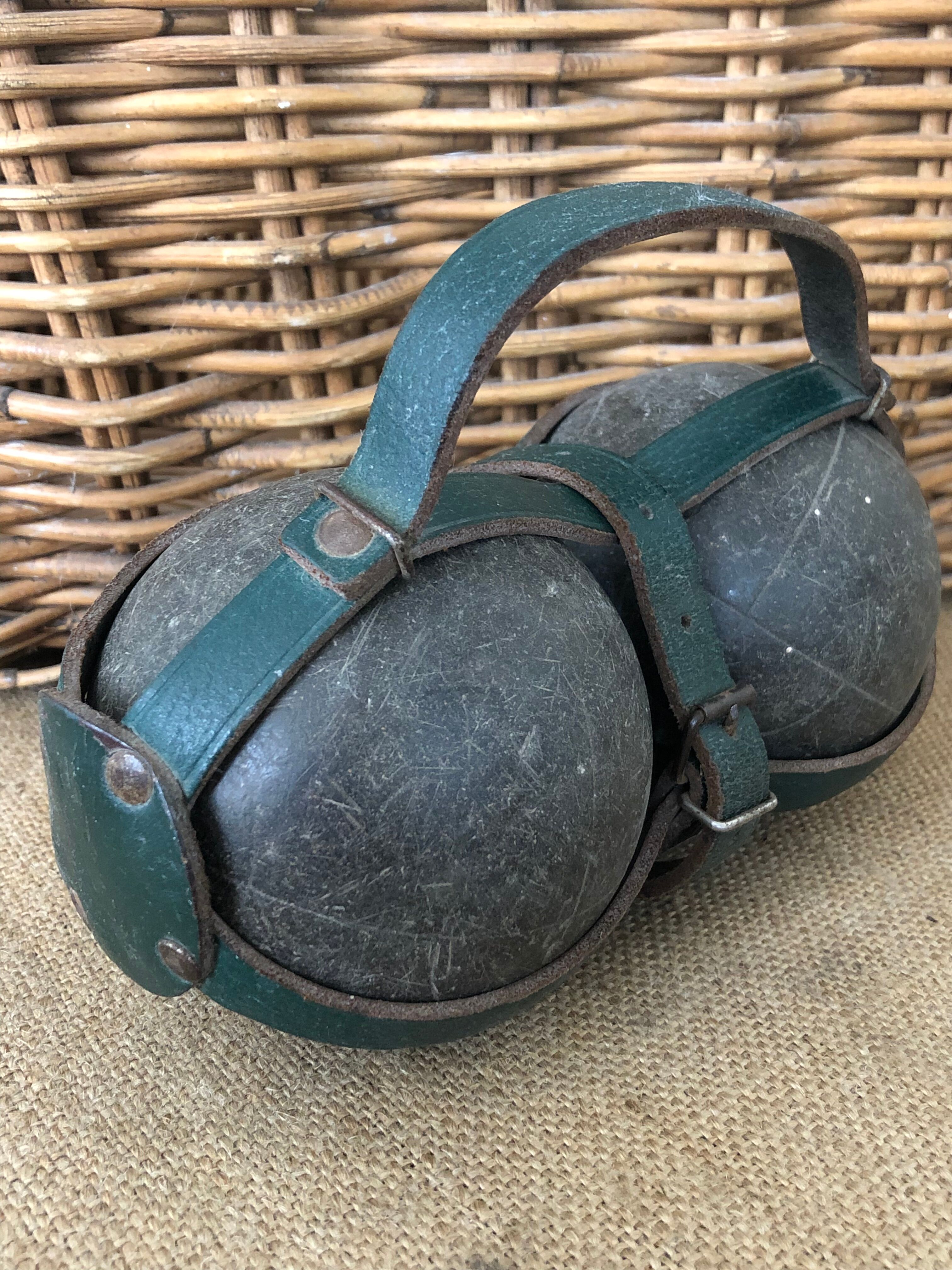 Petanque balls in their strap bag