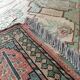 Afghan rug in pastel colors