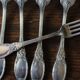 A set of 6 silver-plated foliage forks