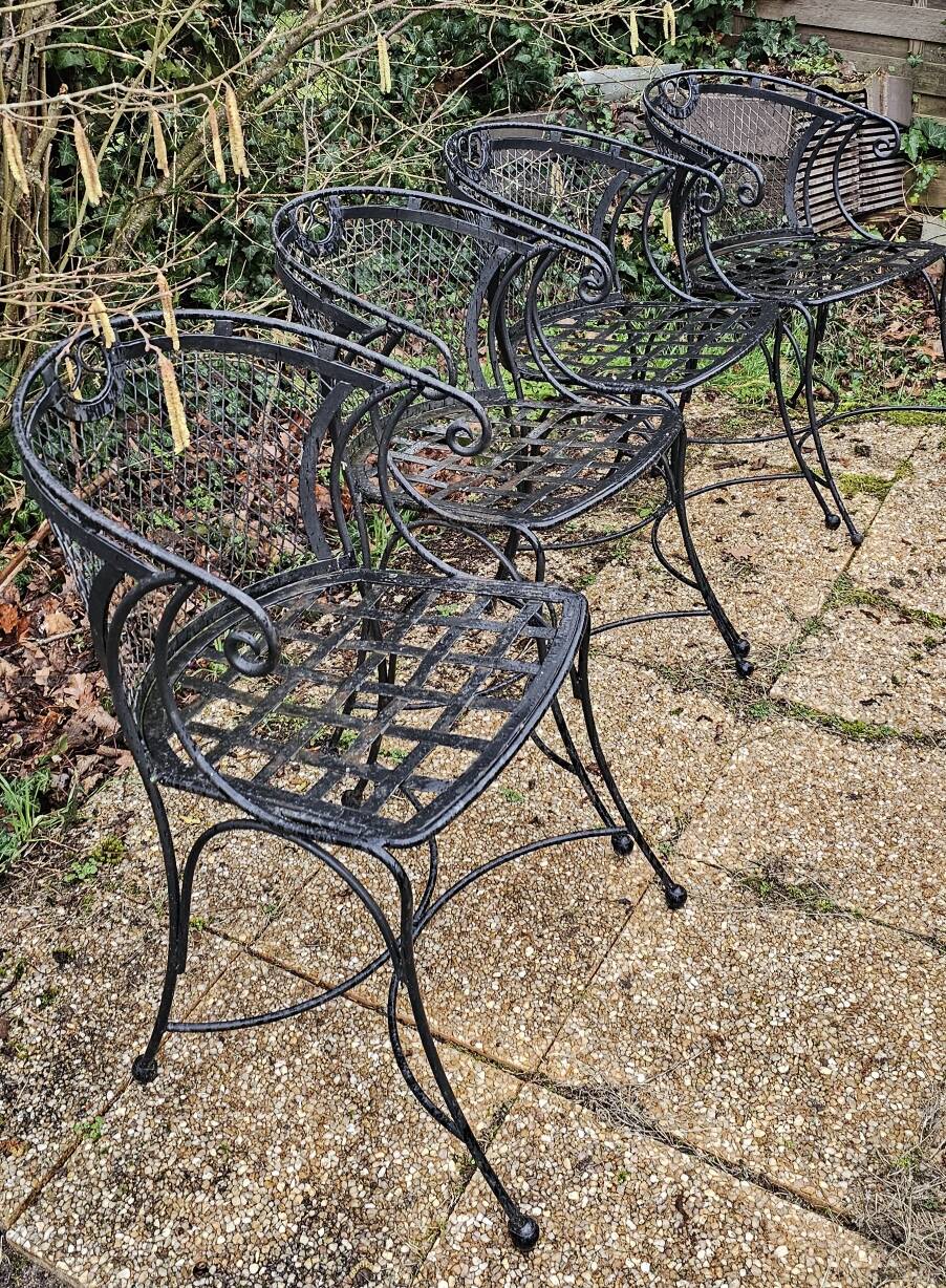 4 wrought iron garden chairs