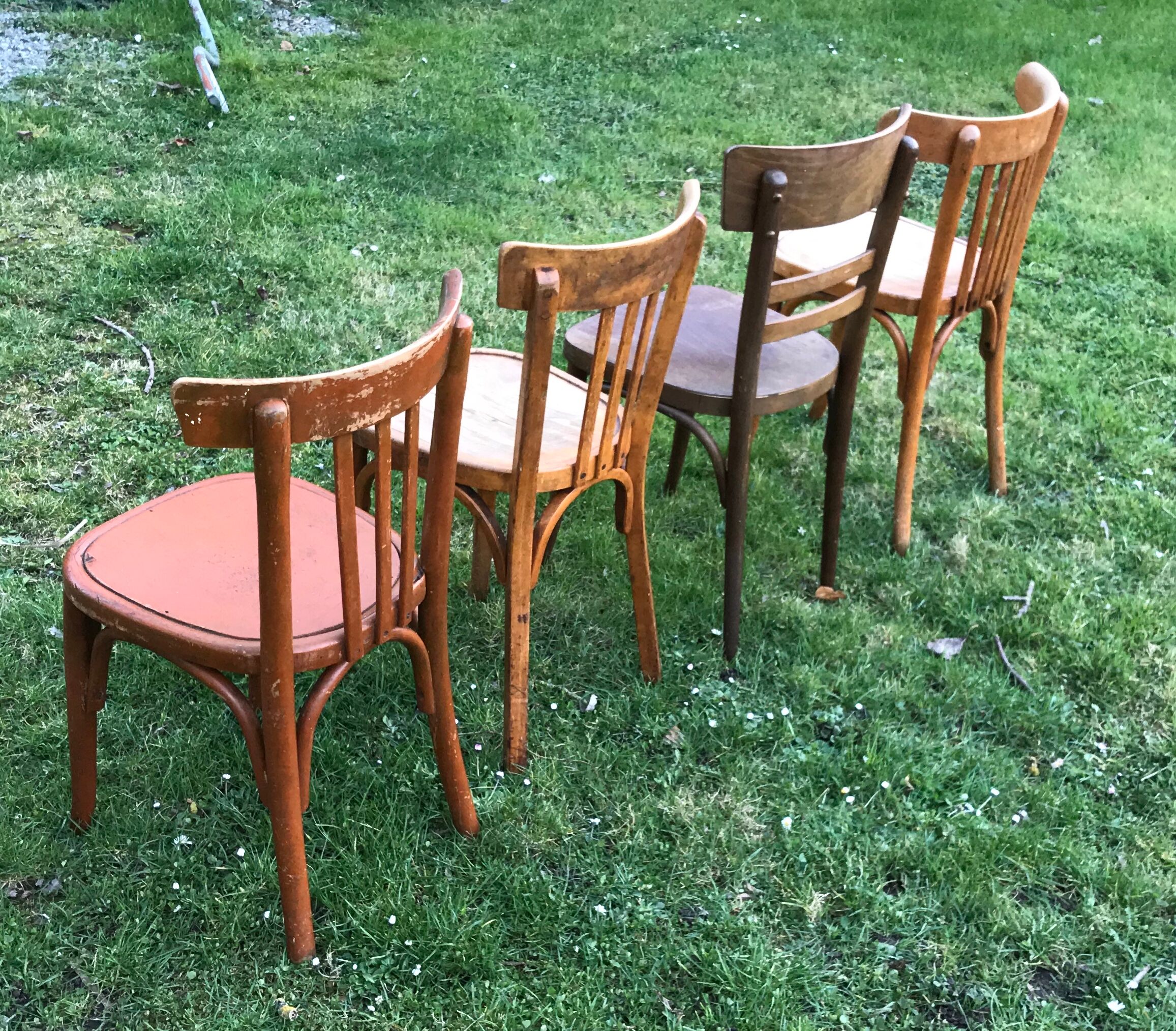 Series of 4 mismatched bistro chairs