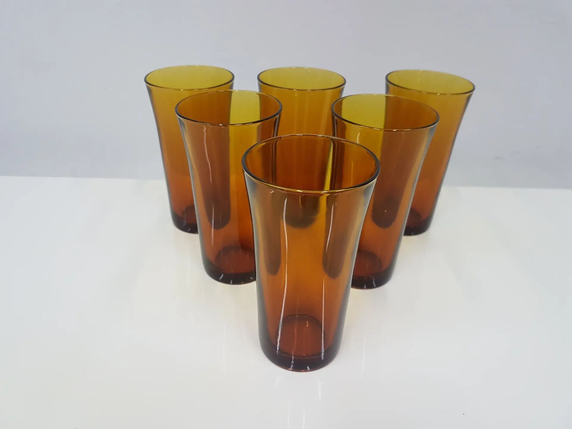 Set of six amber glass tumblers, Duralex, France, 1980s.
