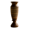 Carved wooden vase sculpture.