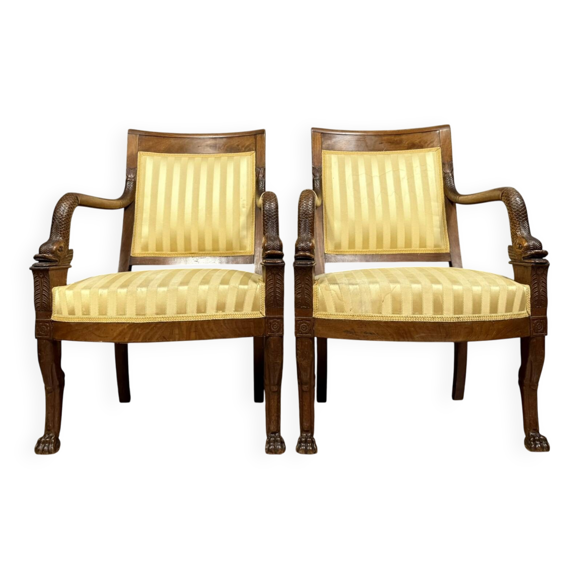 Pair of Empire period mahogany dolphin armchairs