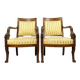 Pair of Empire period mahogany dolphin armchairs