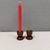 Two beautiful teak candle holders with brass inserts.