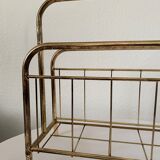 Gilded metal magazine door