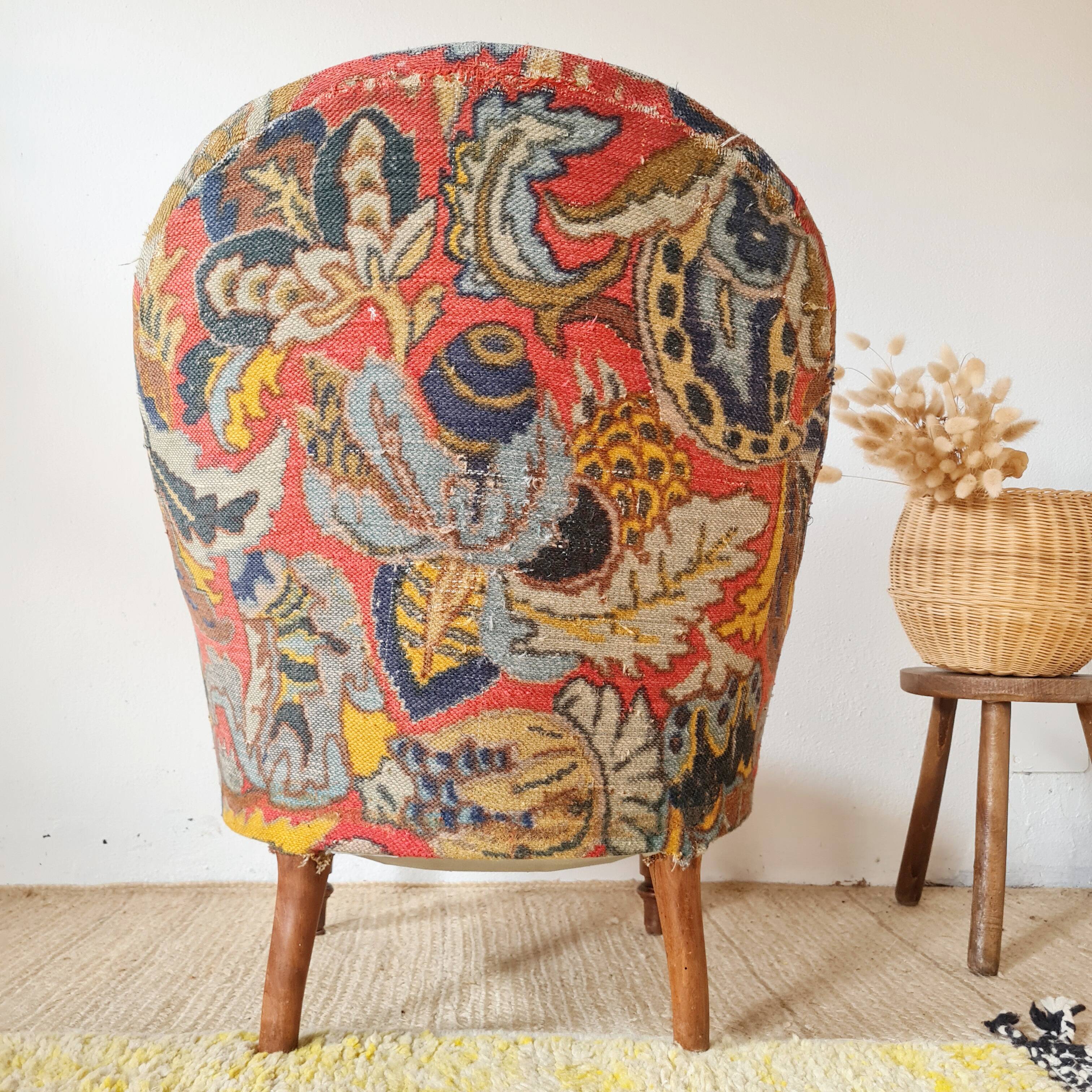 Small "madame" toad chair, vintage, upholstered in multicoloured floral fabric.